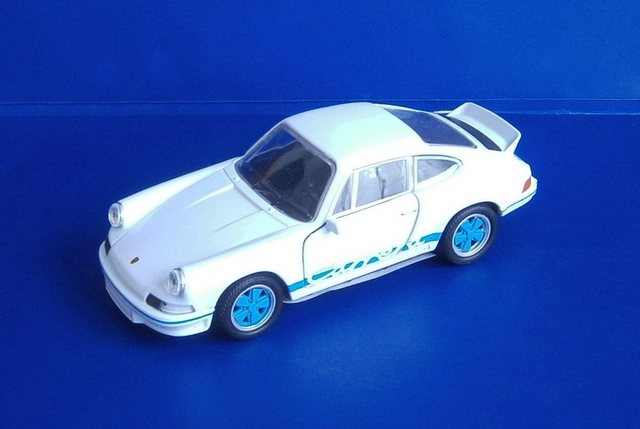 Welly Modellauto PORSCHE 911 Carrera RS 1973 Modellauto Metall Modell Auto Spielzeugauto Kinder Geschenk 45 (Weiss/Blau)