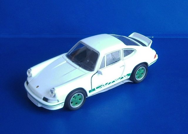 Welly Modellauto PORSCHE 911 Carrera RS 1973 Modellauto Metall Modell Auto Spielzeugauto Kinder Geschenk 45 (Weiss/Grün)